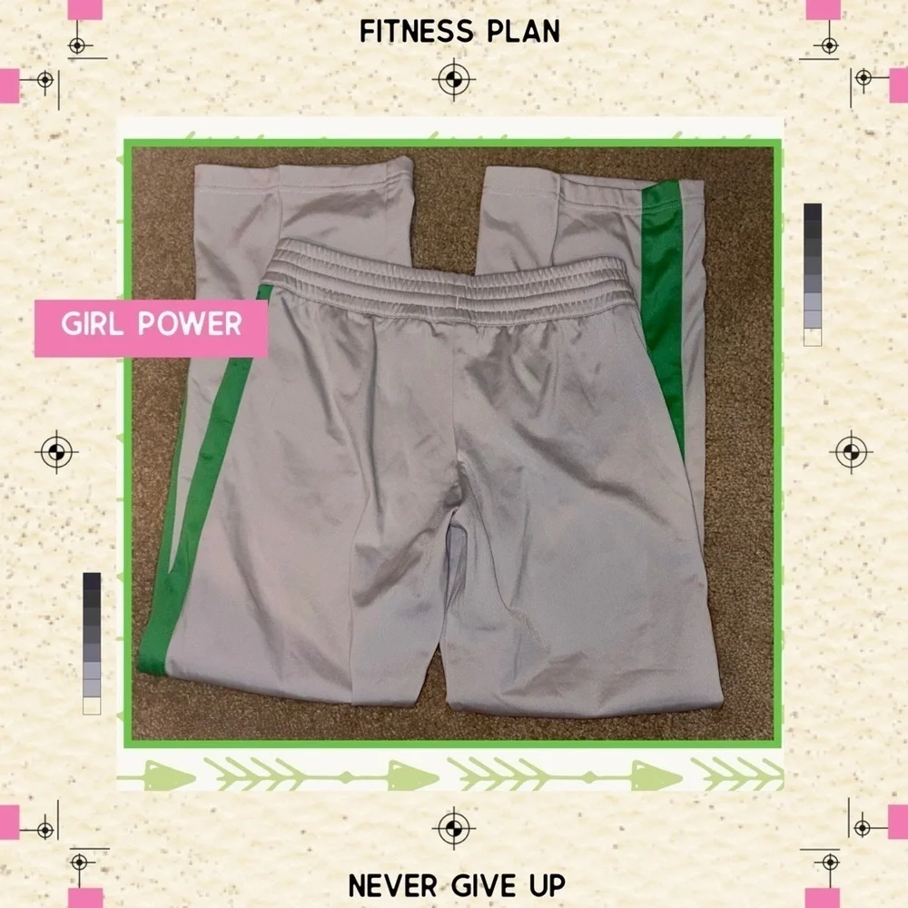 Nike Kids White Joggers with Green and Purple Accents